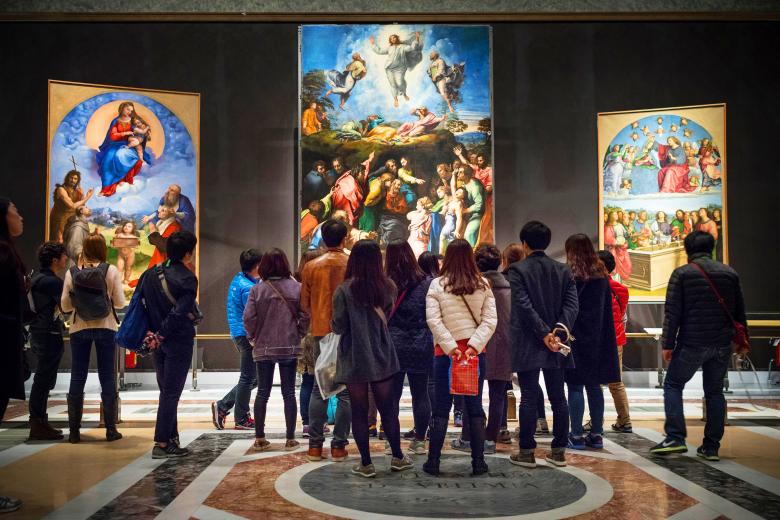 Rome. Italy. Visitors admiring the work of Raphael in the Pinacoteca. Vatican Museums Credit Alamy H3J751