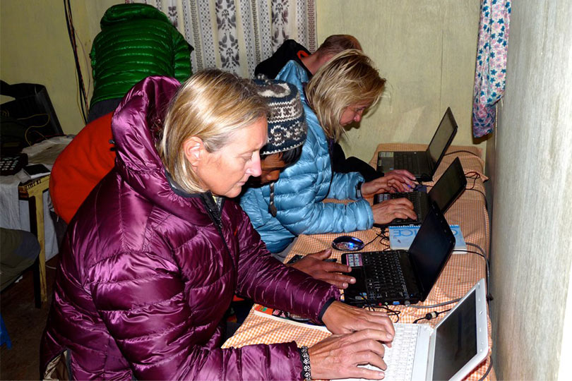 Trekkers in cyber cafe in the himalayas
